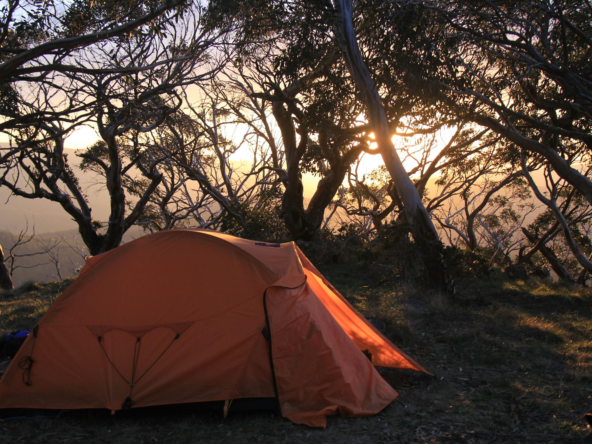 Camping on Mt Buggery. Photo of a tent taken at sunset.