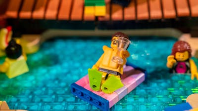 LEGO® minifigure in pool in RELICS exhibit