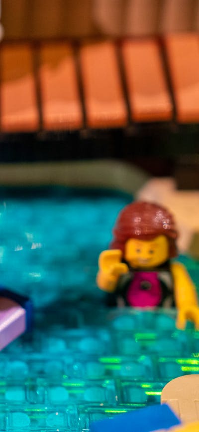 LEGO® minifigure in pool in RELICS exhibit