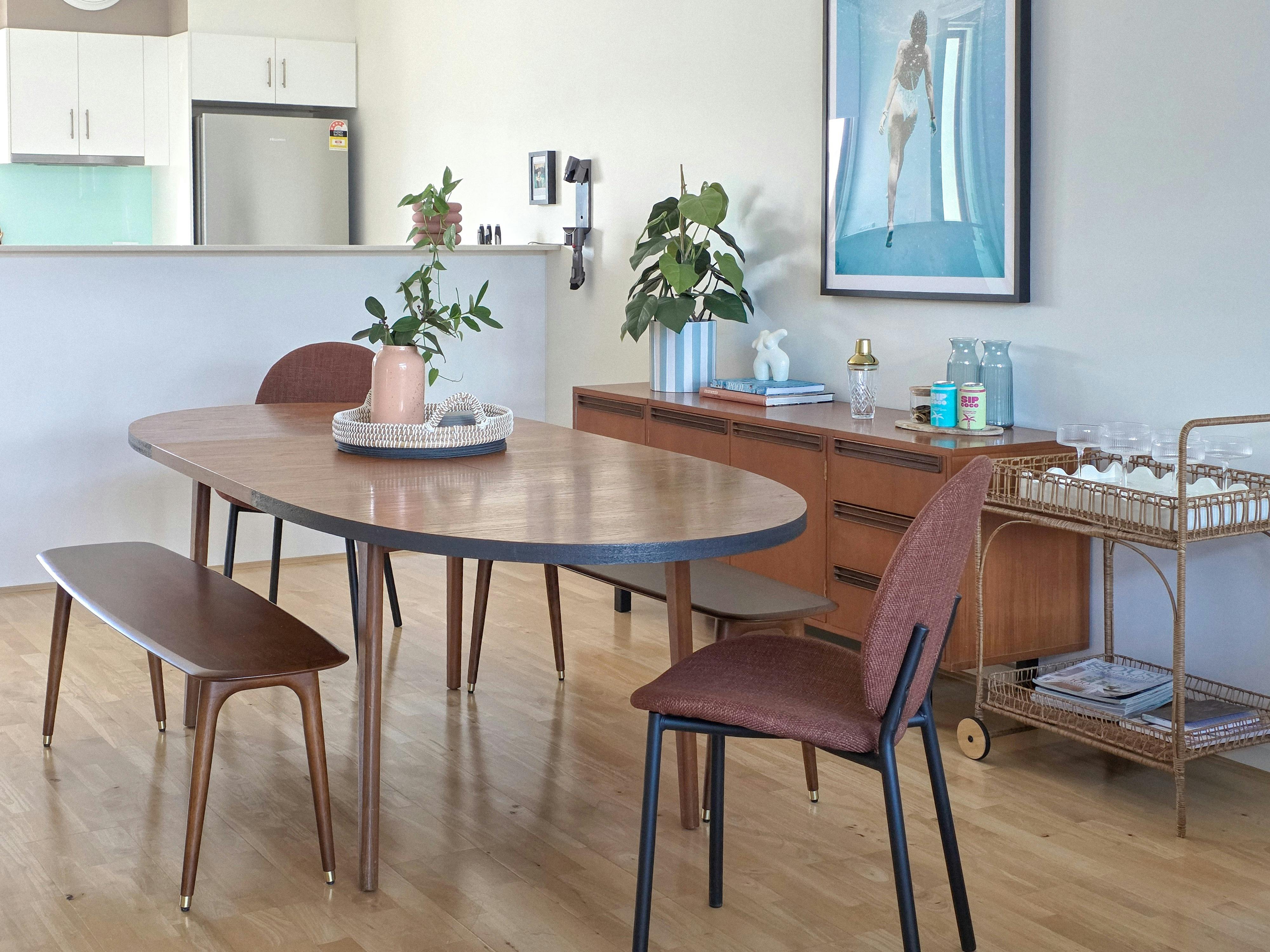 Stylish indoor dining table with chairs, creating a welcoming space to gather and enjoy meals togeth