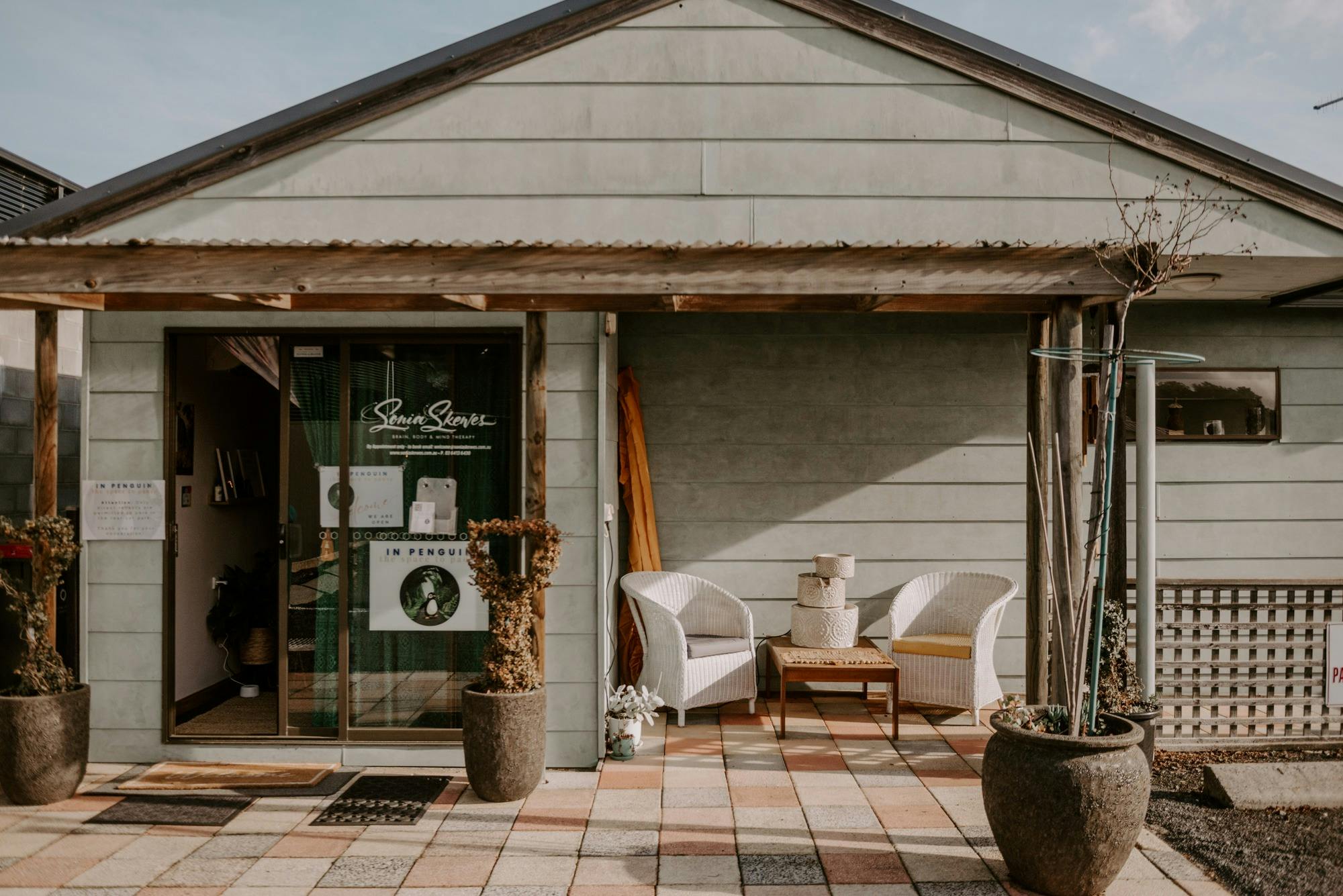 outside sitting at In Penguin: the speace to pause in the heart of Penguin, TAS.