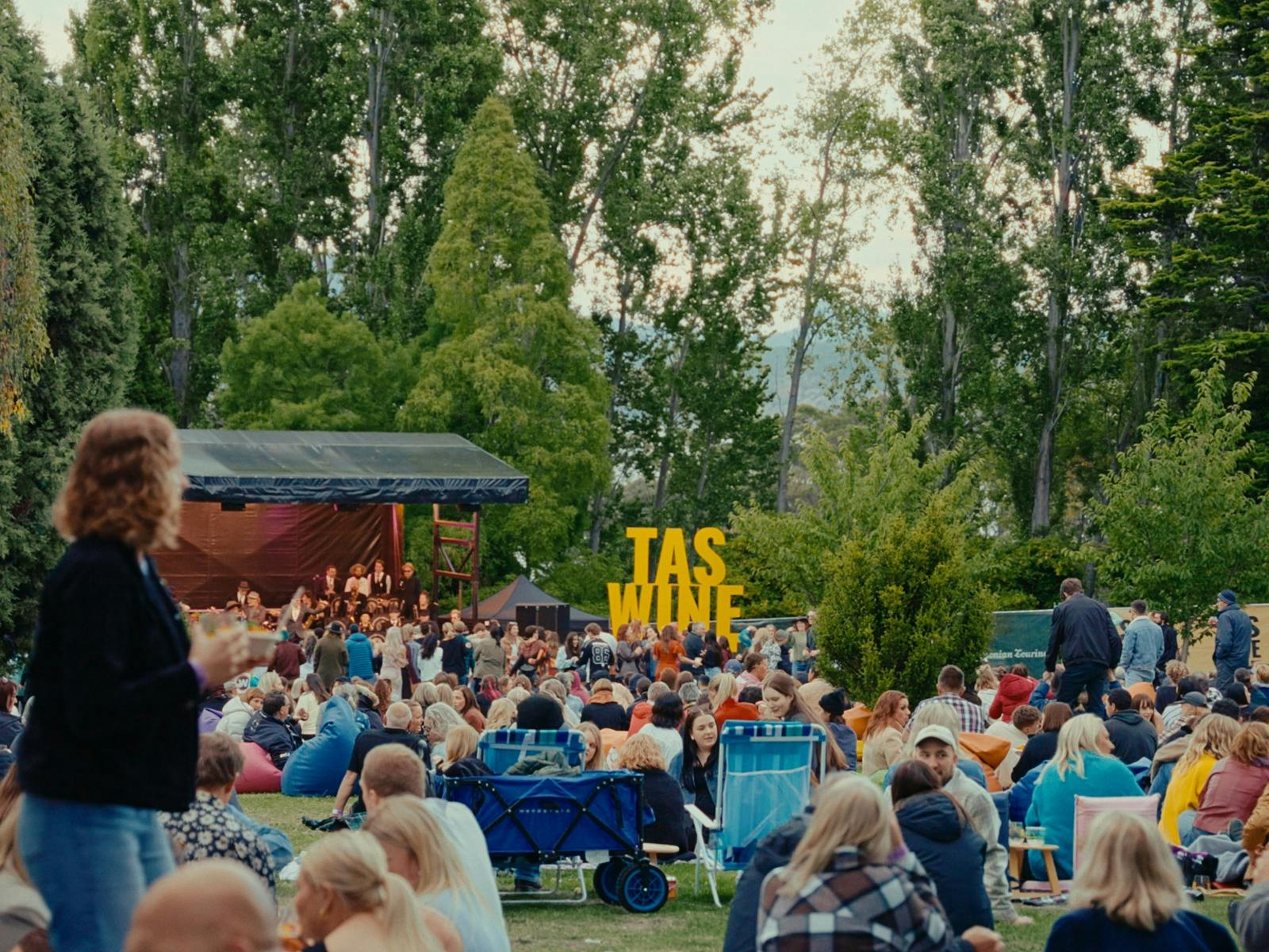 Image of the stage and a large crowd at the Tasmanian Wine Festival