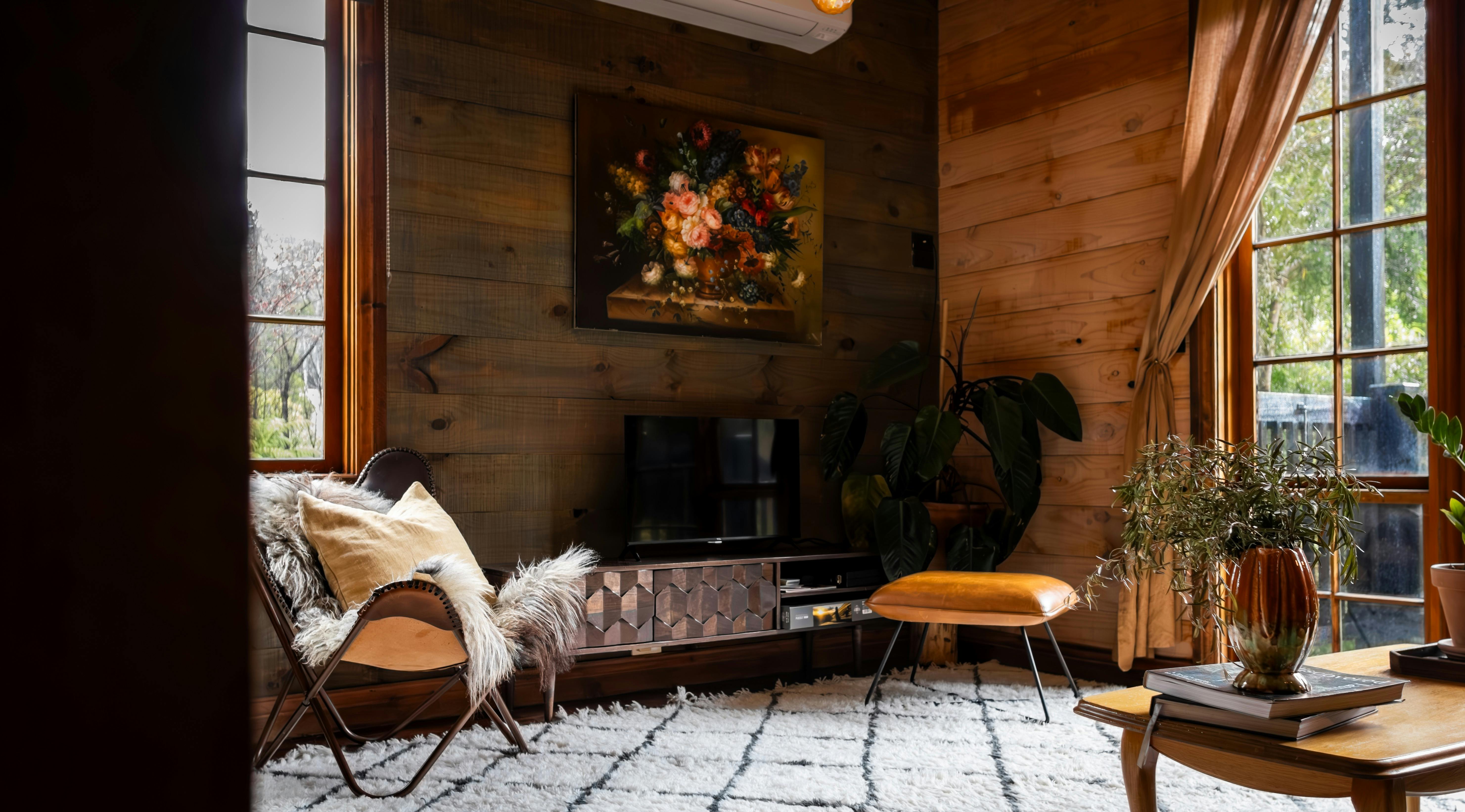 Corner of room with vintage painting and television