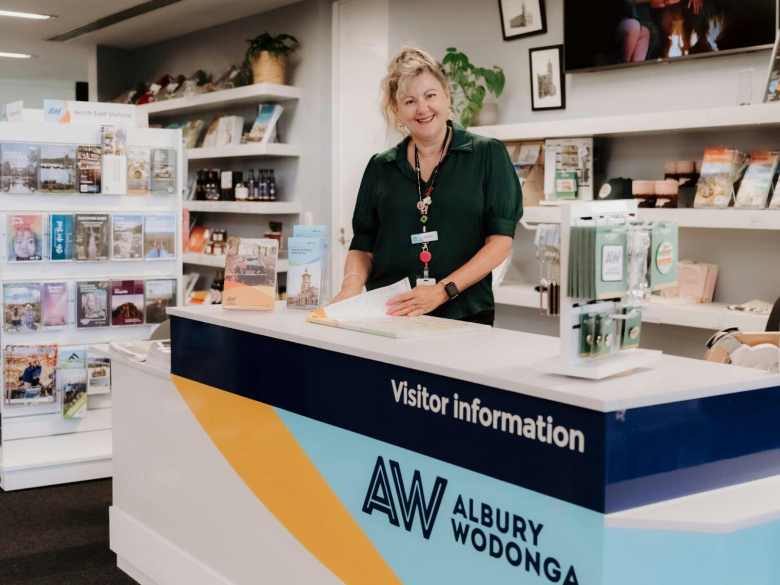 staff member greeting at visitor information centre