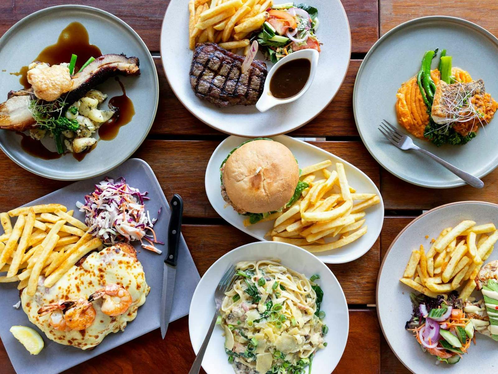 Various food dishes on a table Various food dishes on a table