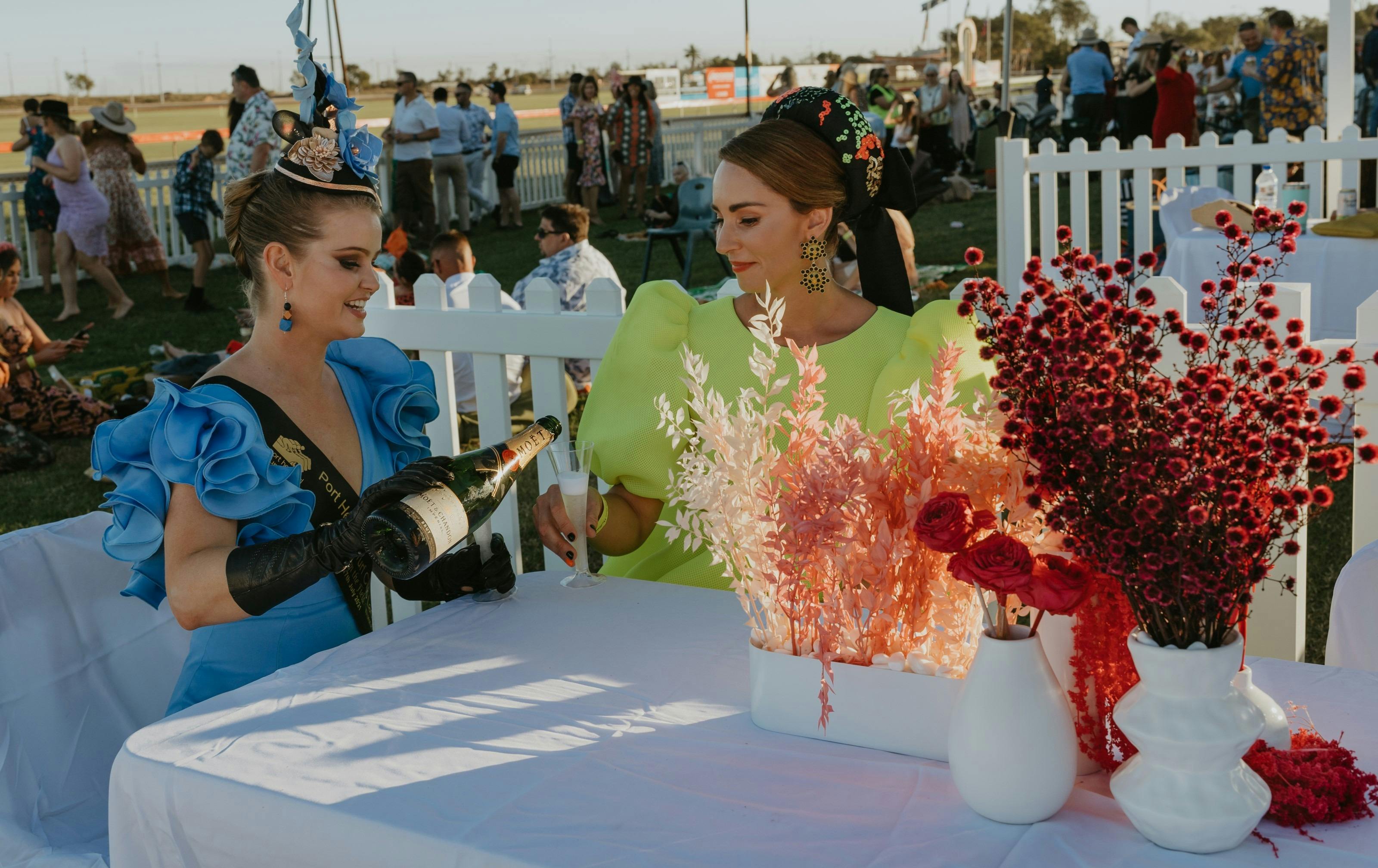 Two Ladies with Champagne at Port Hedland Turf Club
