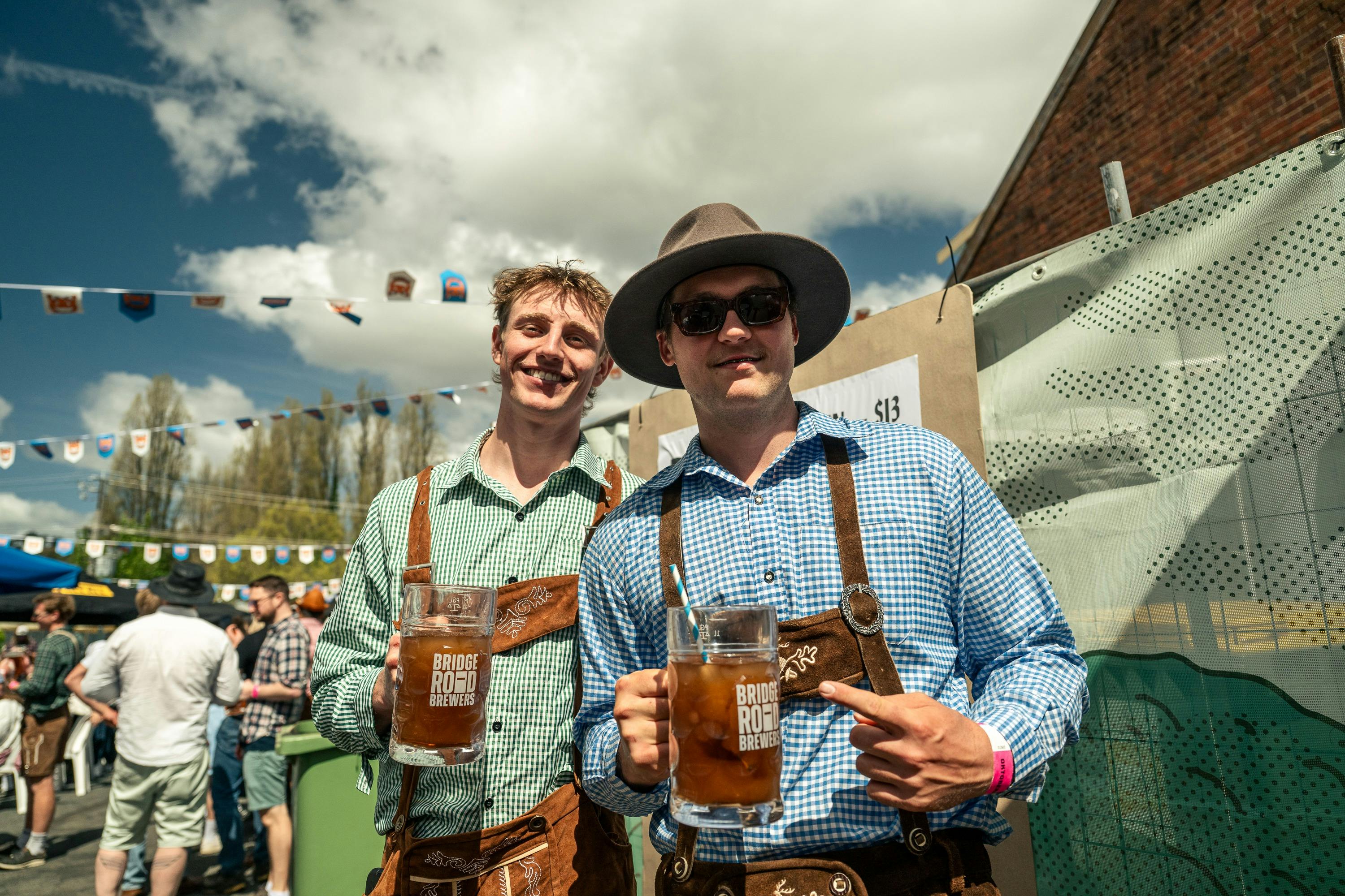 Two young men smiling to the camera