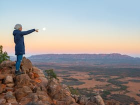 Touching the moon at dusk from Chace Range during a heli-camping experience