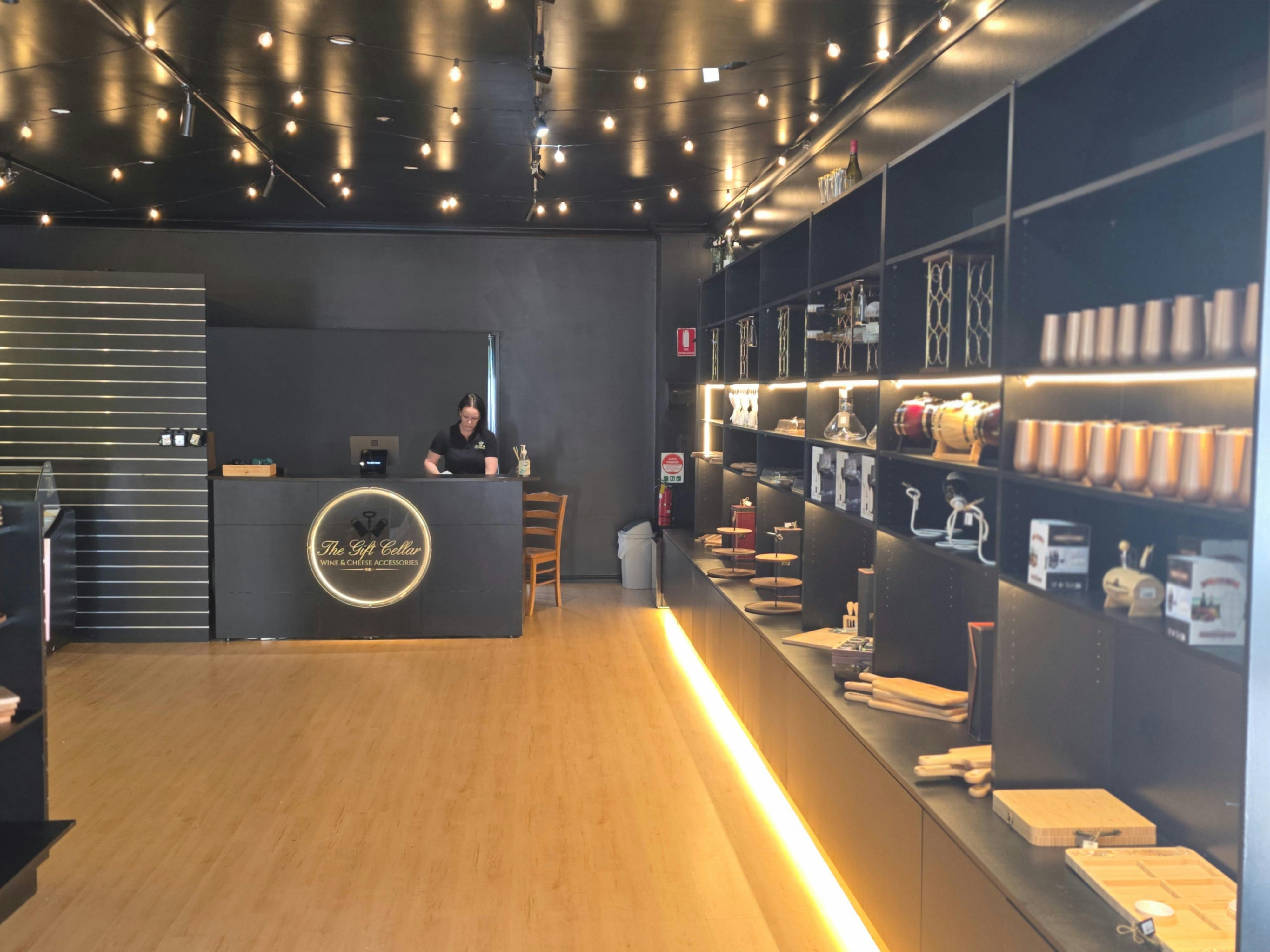 Interior wide shot showing the shop layout and product displays.