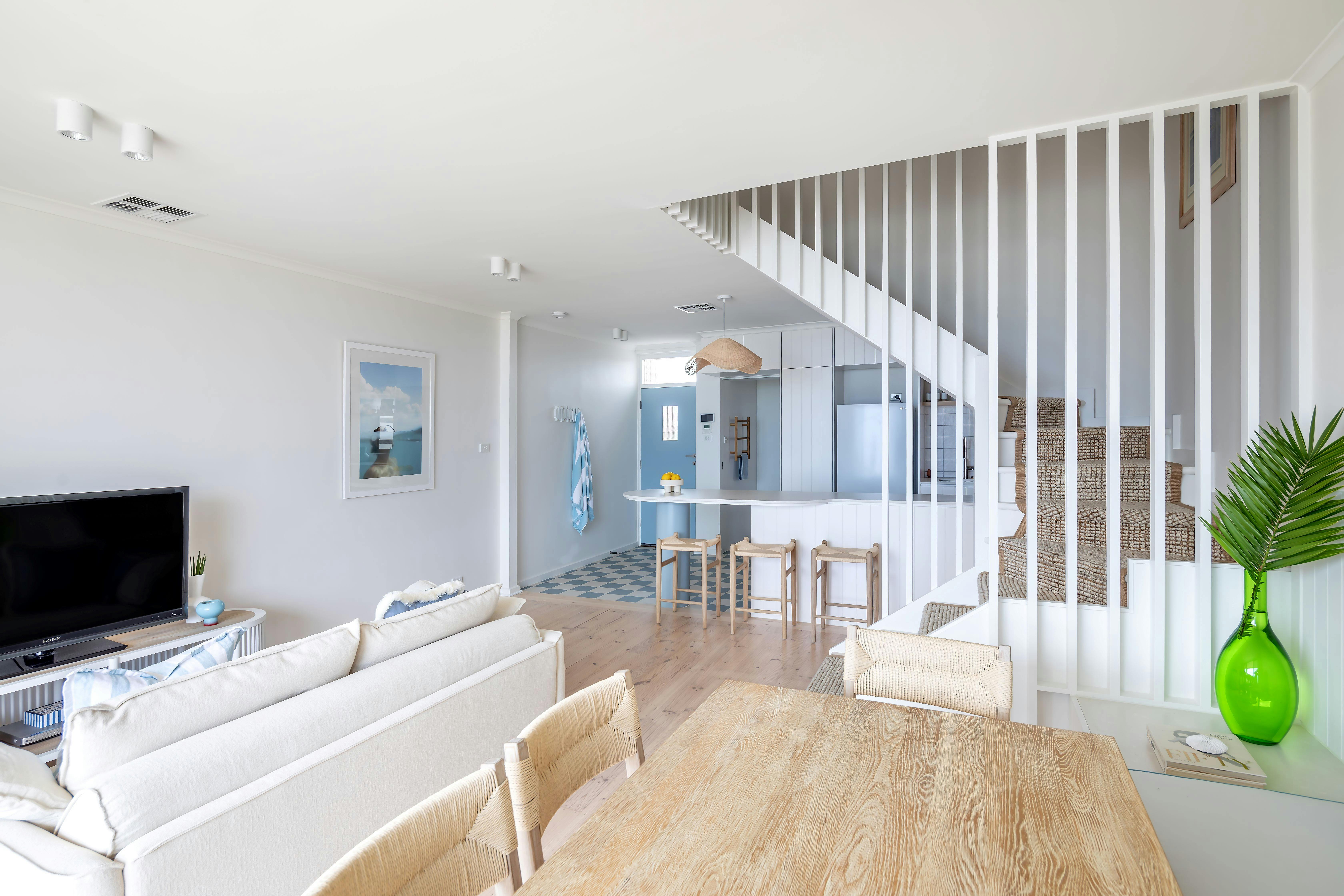 Open plan kitchen, dining and living with a sea view