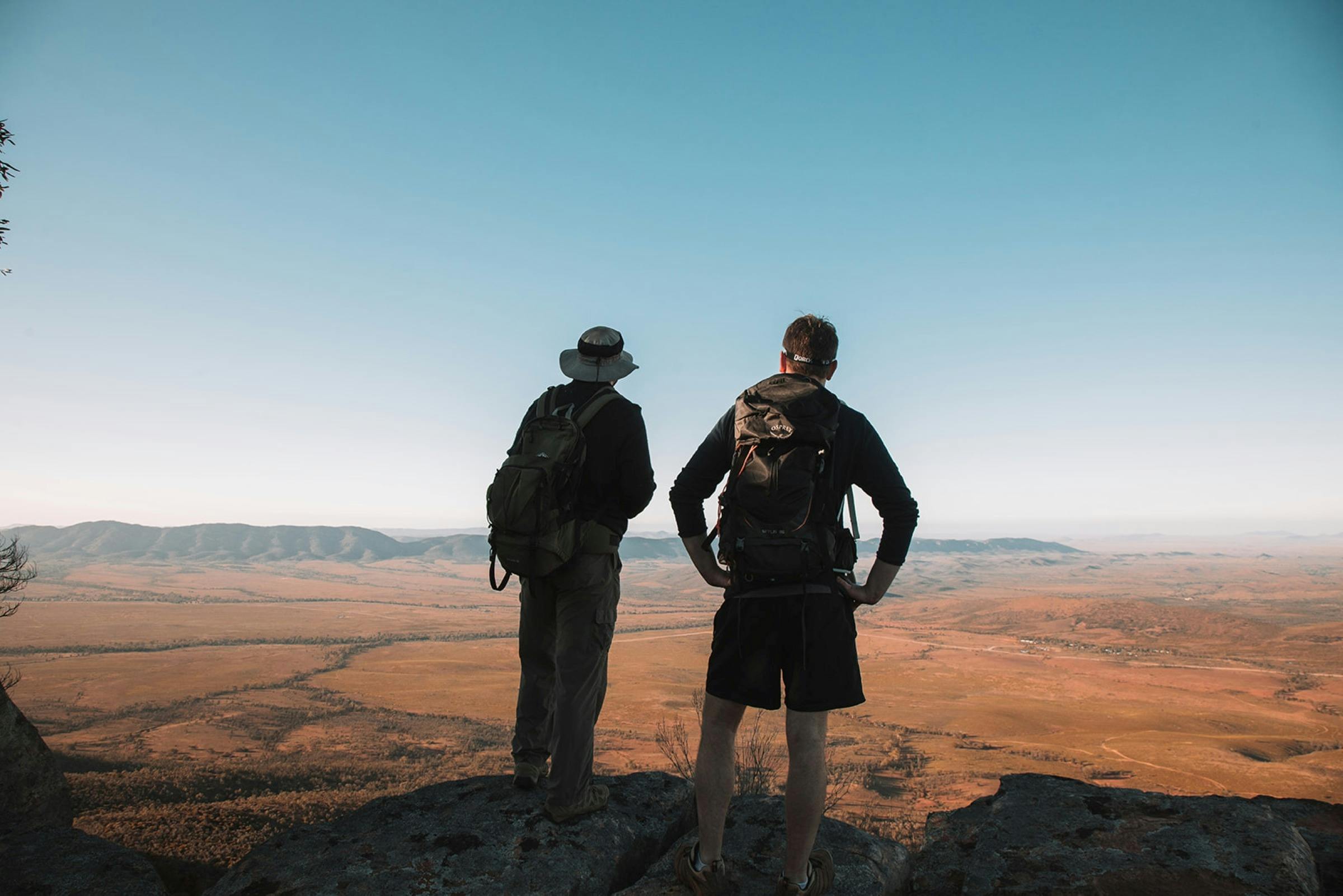 Two people stopping to take in the view of Wilpena Pound