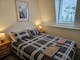 Bedroom with bedside tables and lamps