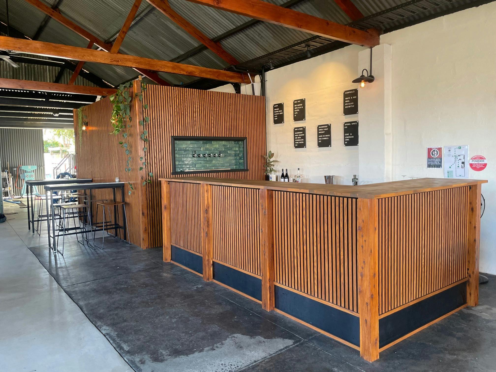 Long view of bar and taps