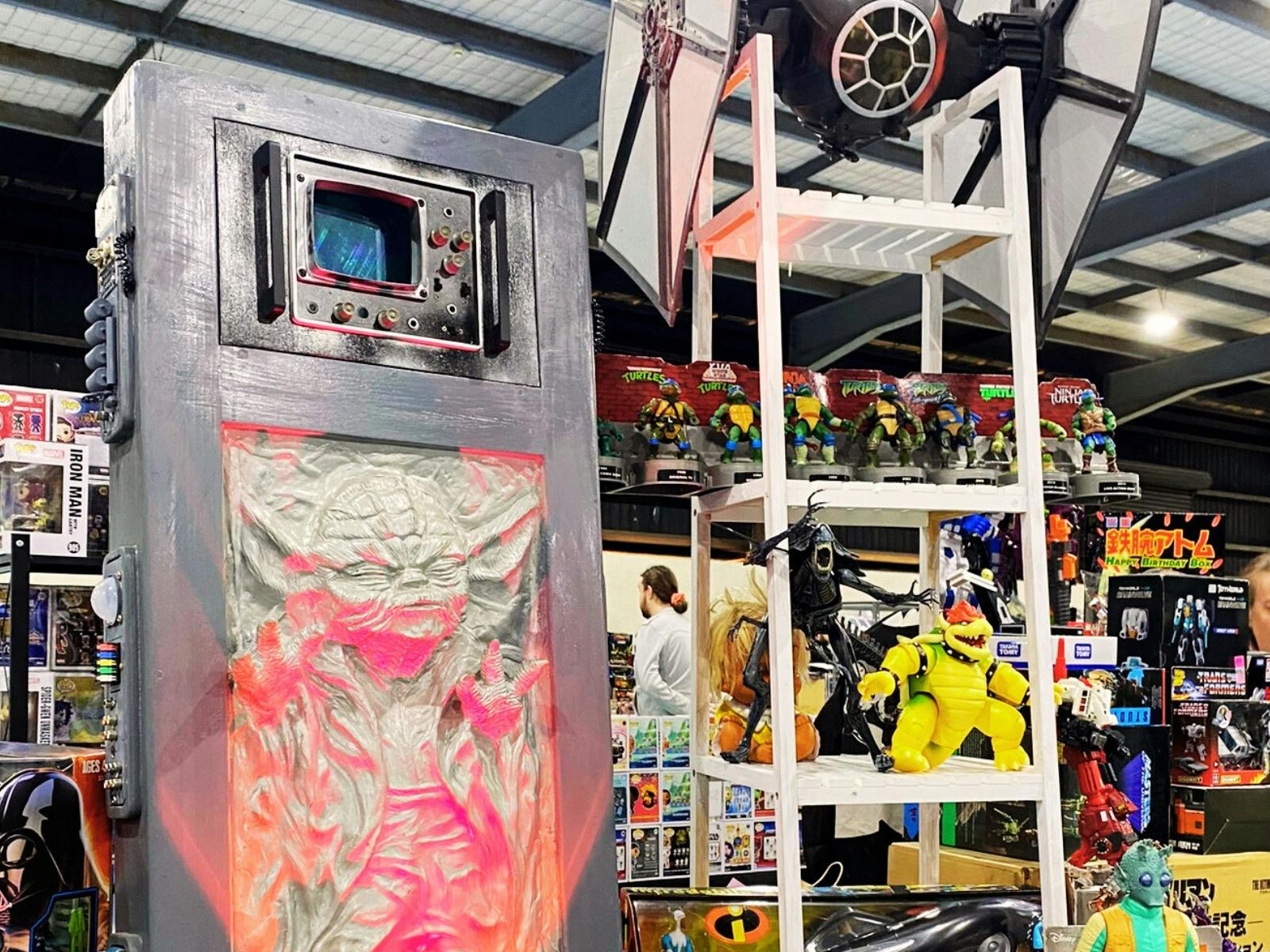 Custom Yoda from Star Wars in carbonite and action figures on display for sale