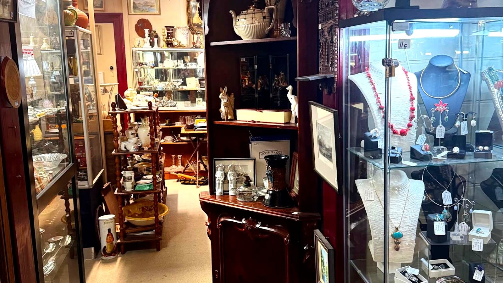 Antique jewellery, sterling silver and collectables in secure display cabinets