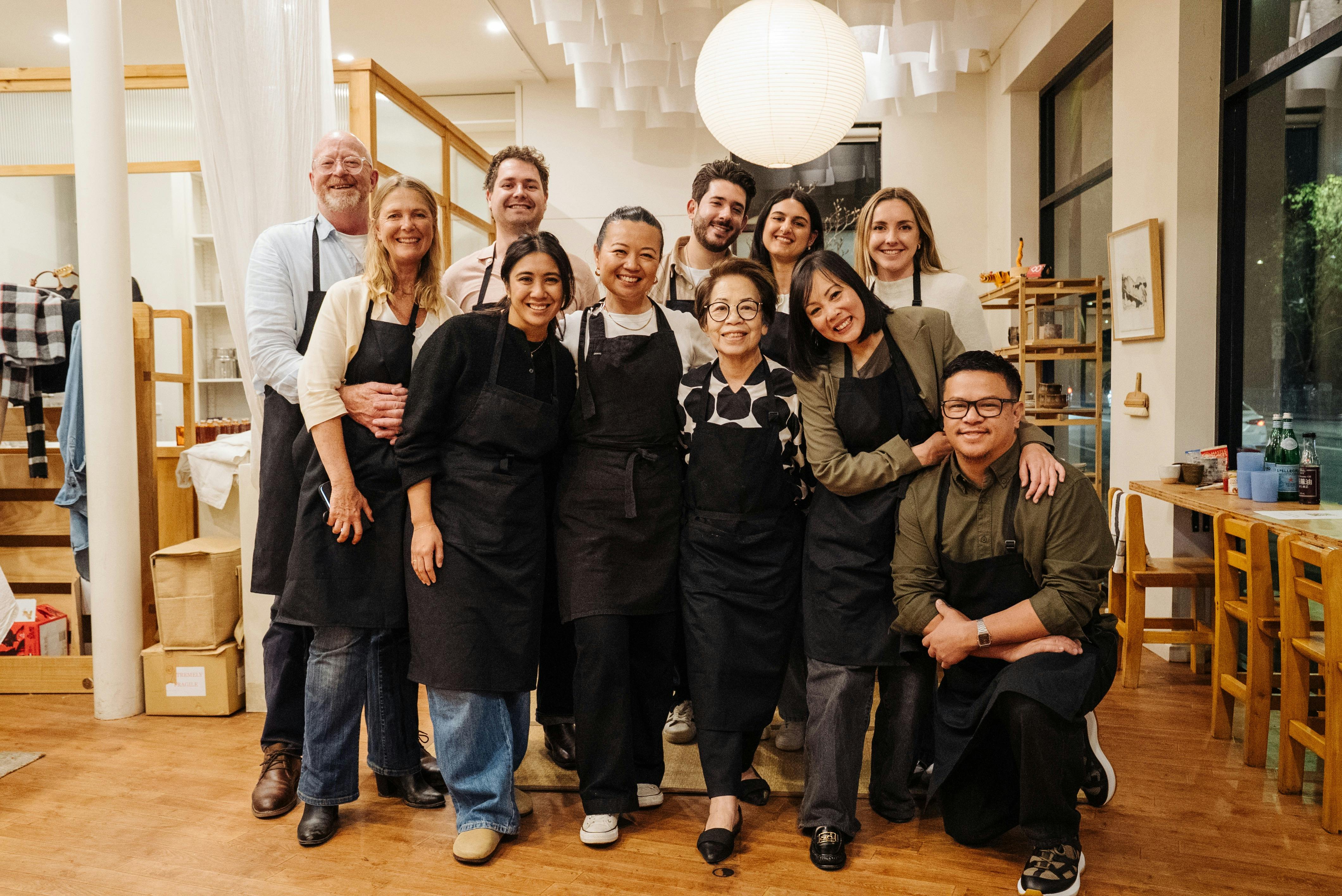 A group of people with the Mother and daughter, experience guides smiling at the end of the night