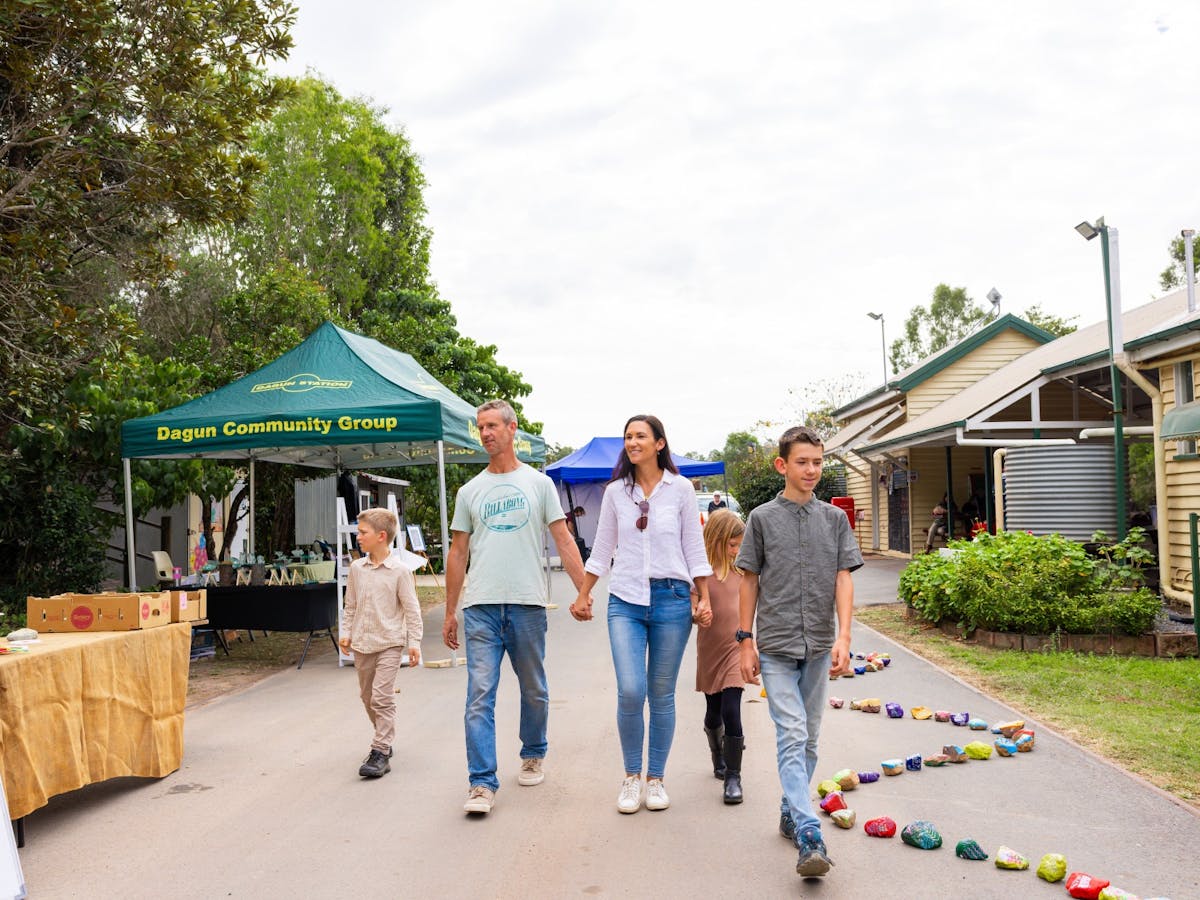 Family walking through the Dagun Markets