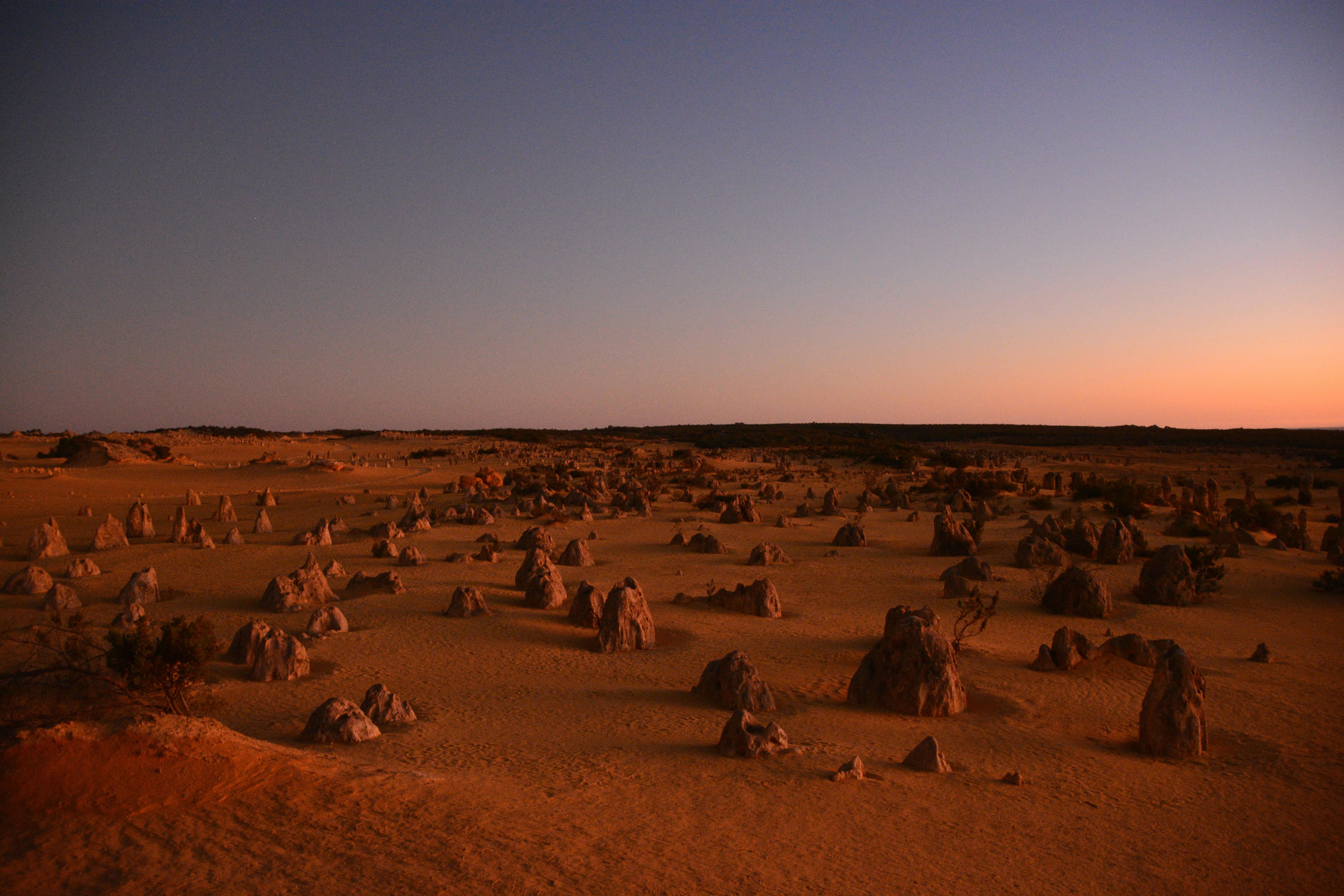 Sun setting over the Pinnacles, a group of natural sandstone structures