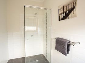 MAIN BATHROOM WITH SEPERATE VANITY ROOM AND TOILET