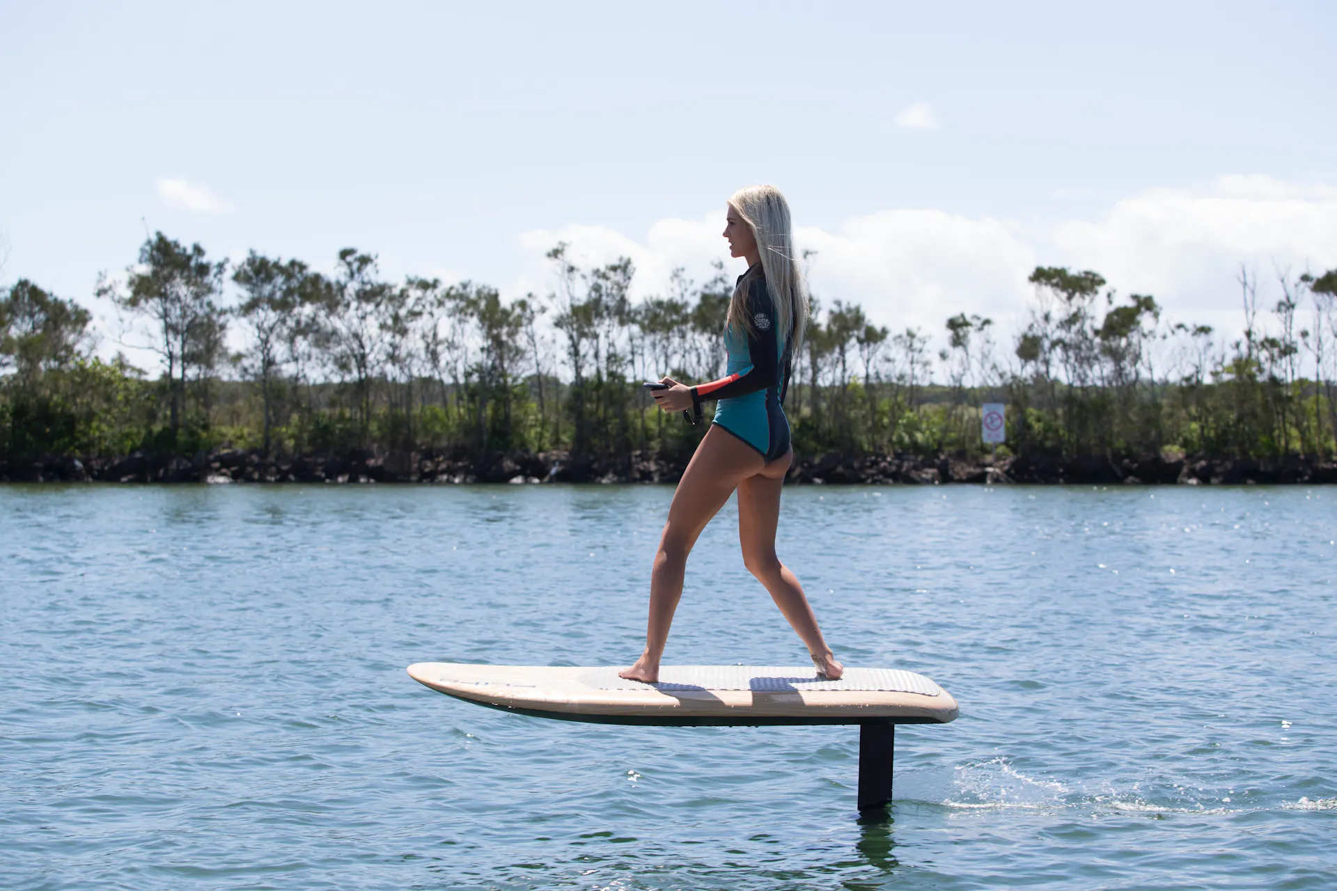 Lady on Fliteboard Flite school Noosa Efoiling  Tour