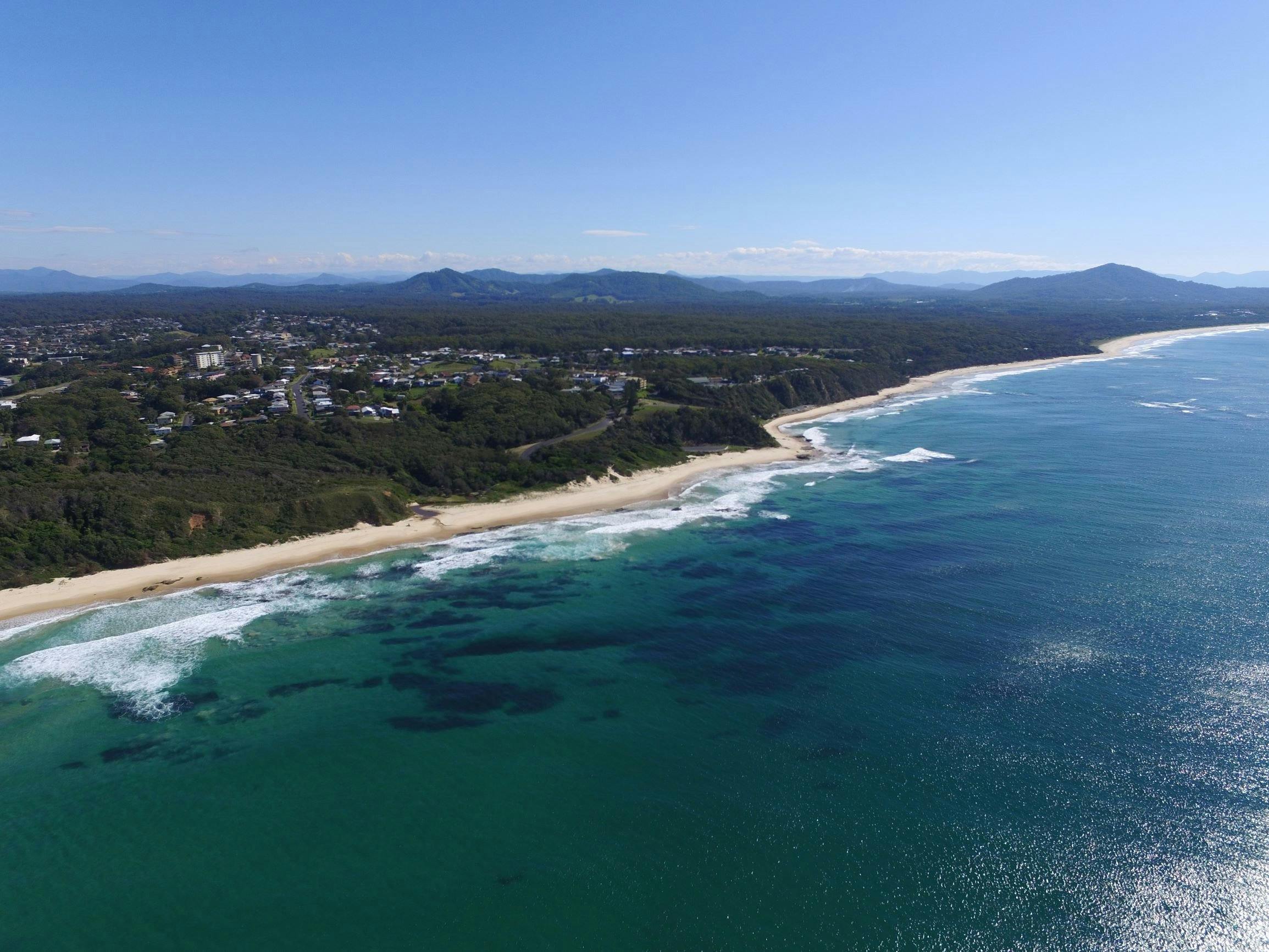 Aerial of Valla looking up the coast, just spectular, mountains in the background
