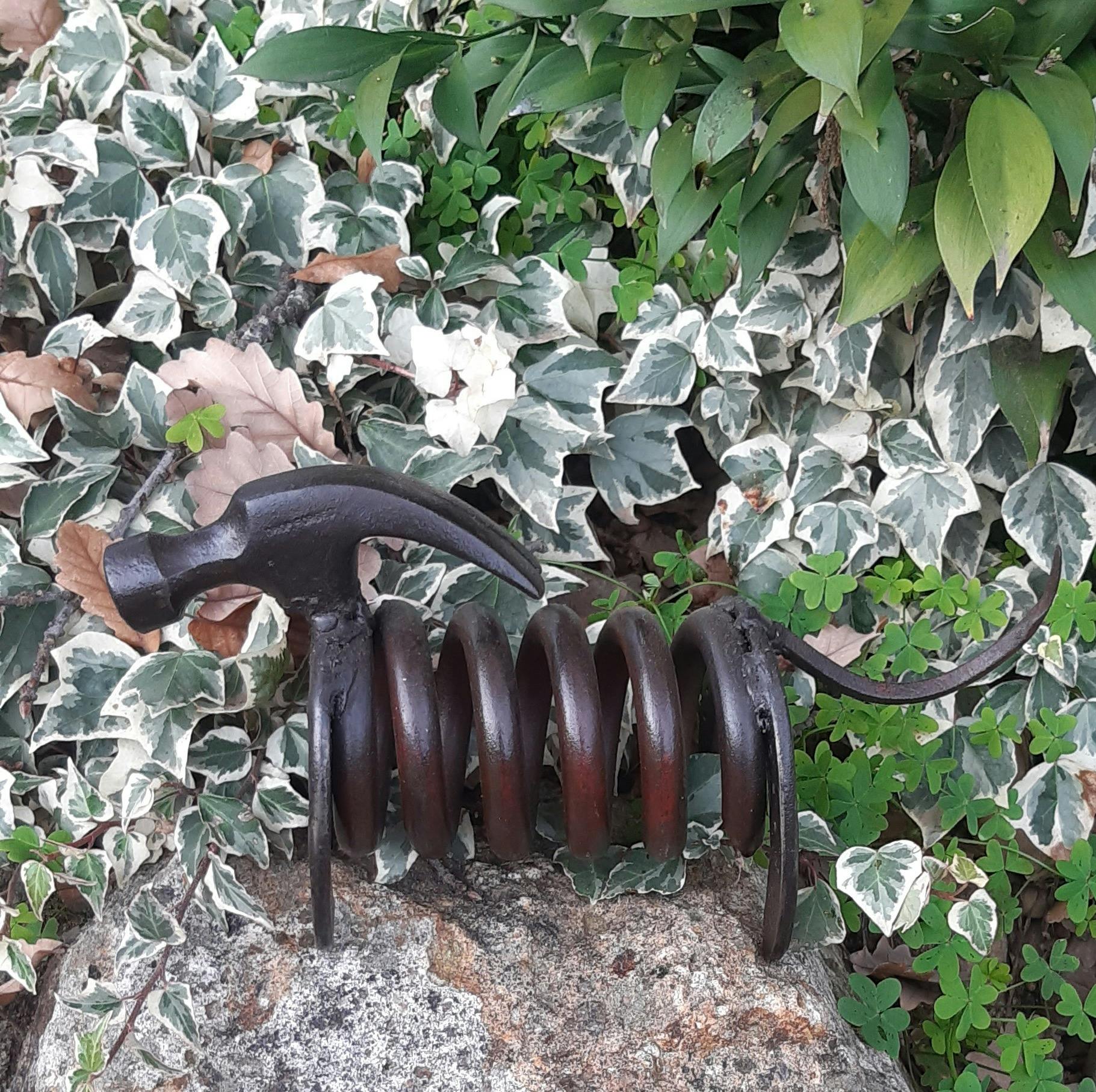 Hound made from reclaimed farm metal