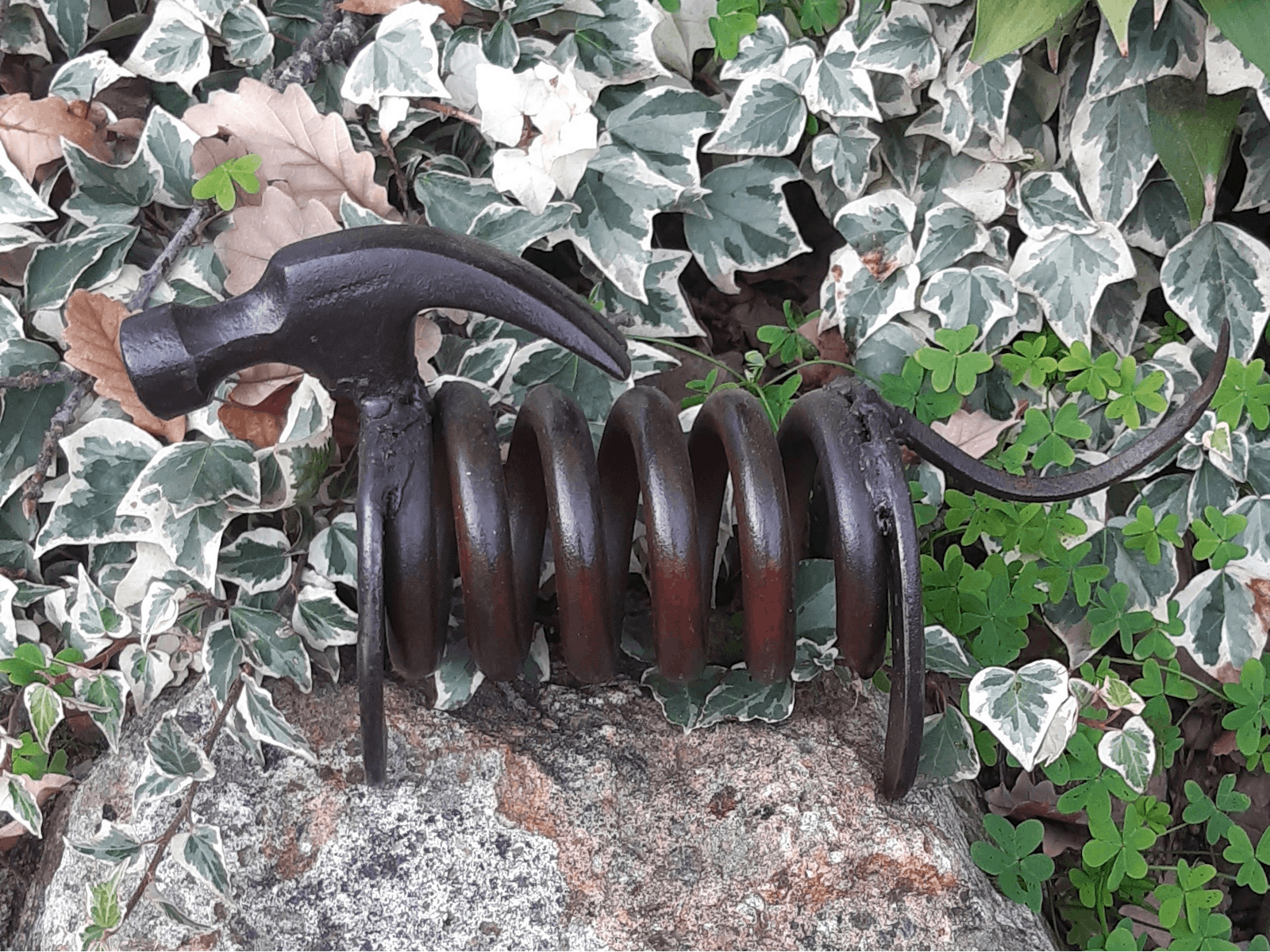 Hound made from reclaimed farm metal