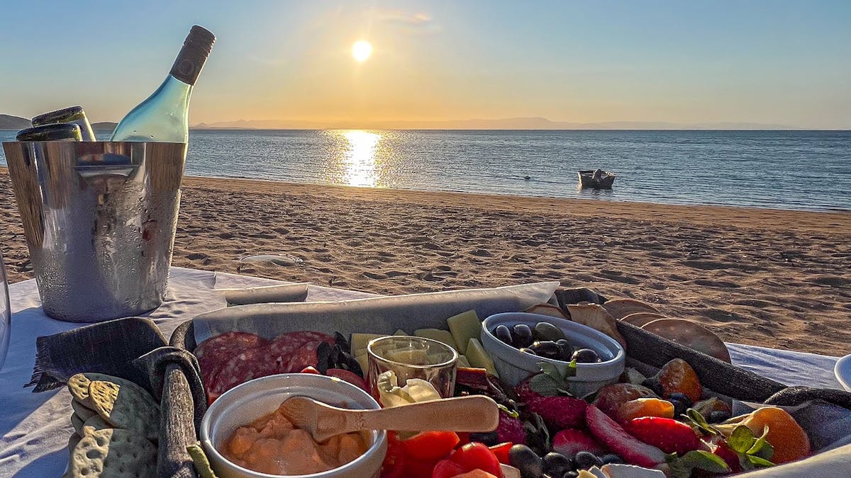 Platter and drinks on beach