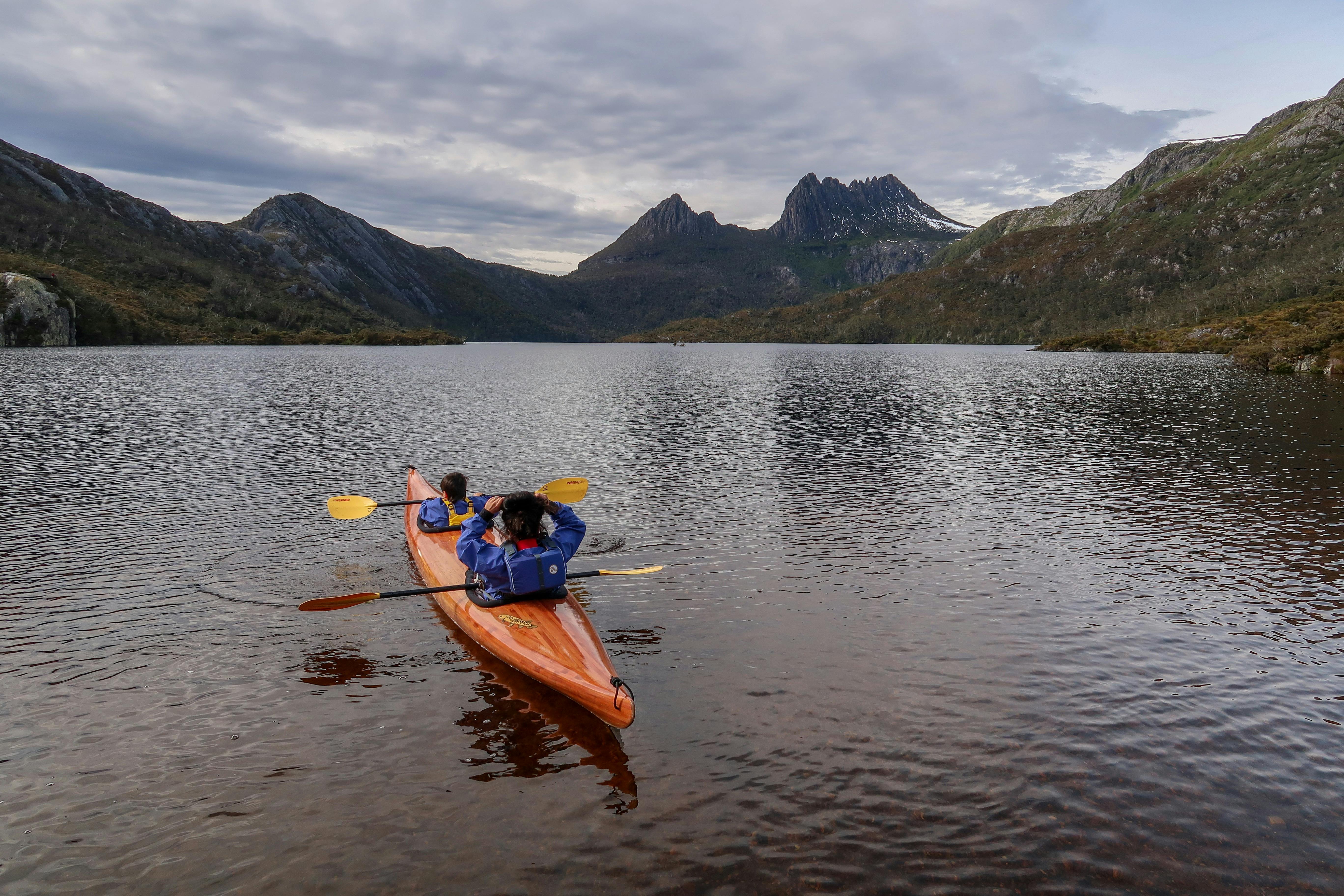 Immerse yourself in the vista on the Dove Lake Kayak in hand-built King Billy pine kayaks