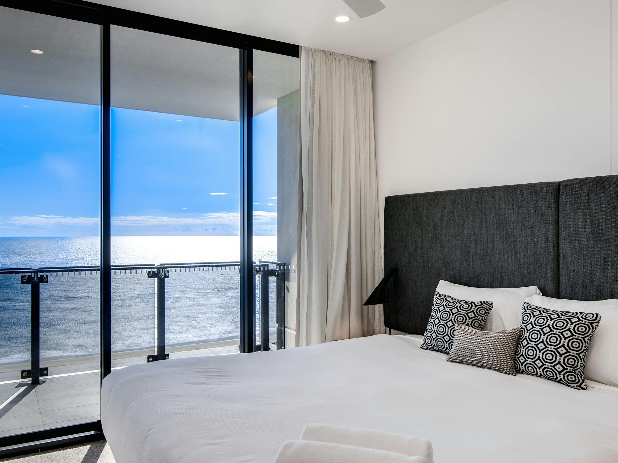 Master bedroom with king bed and ocean views Master bedroom with king bed and ocean views