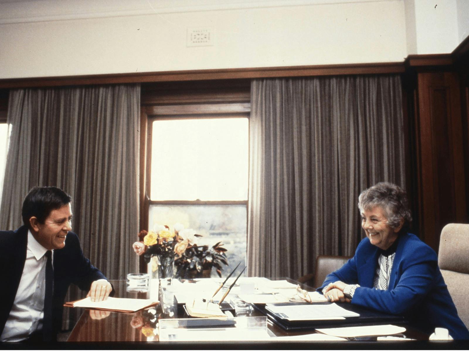 Joan Child sitting at her desk in the Speaker's Suite