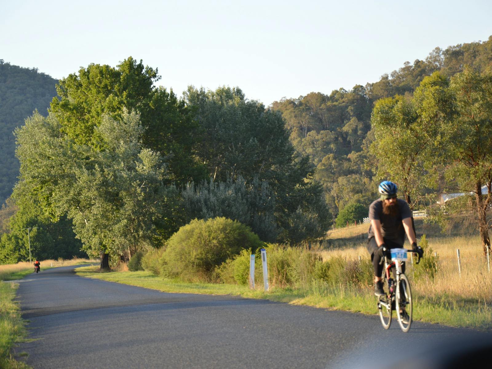 A rider on the course at Tumut Plains, part of the Tumut Cycle Classic 2019, in the Snowy Valleys