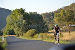 A rider on the course at Tumut Plains, part of the Tumut Cycle Classic 2019, in the Snowy Valleys