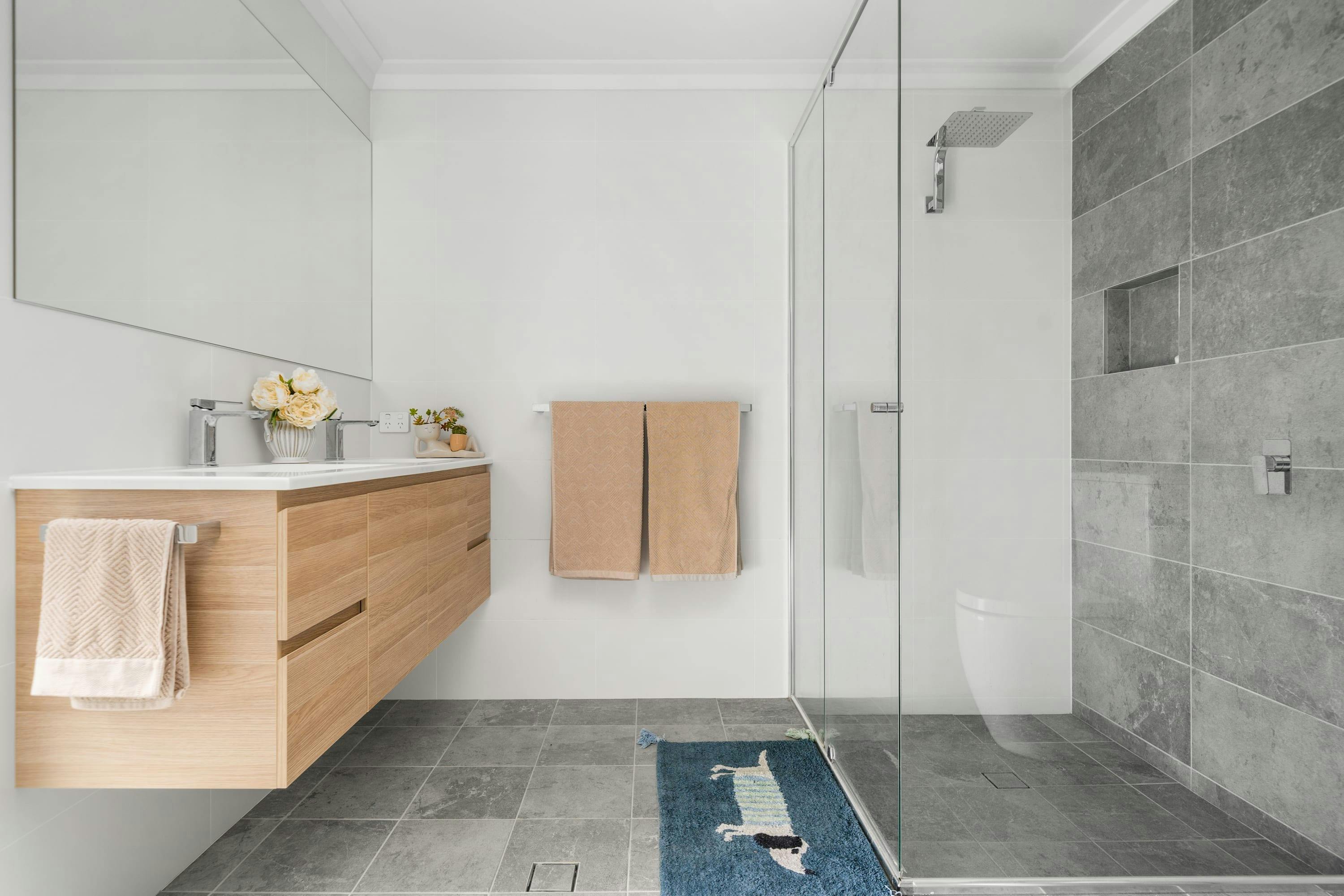 Ensuite bathroom with shower and vanity