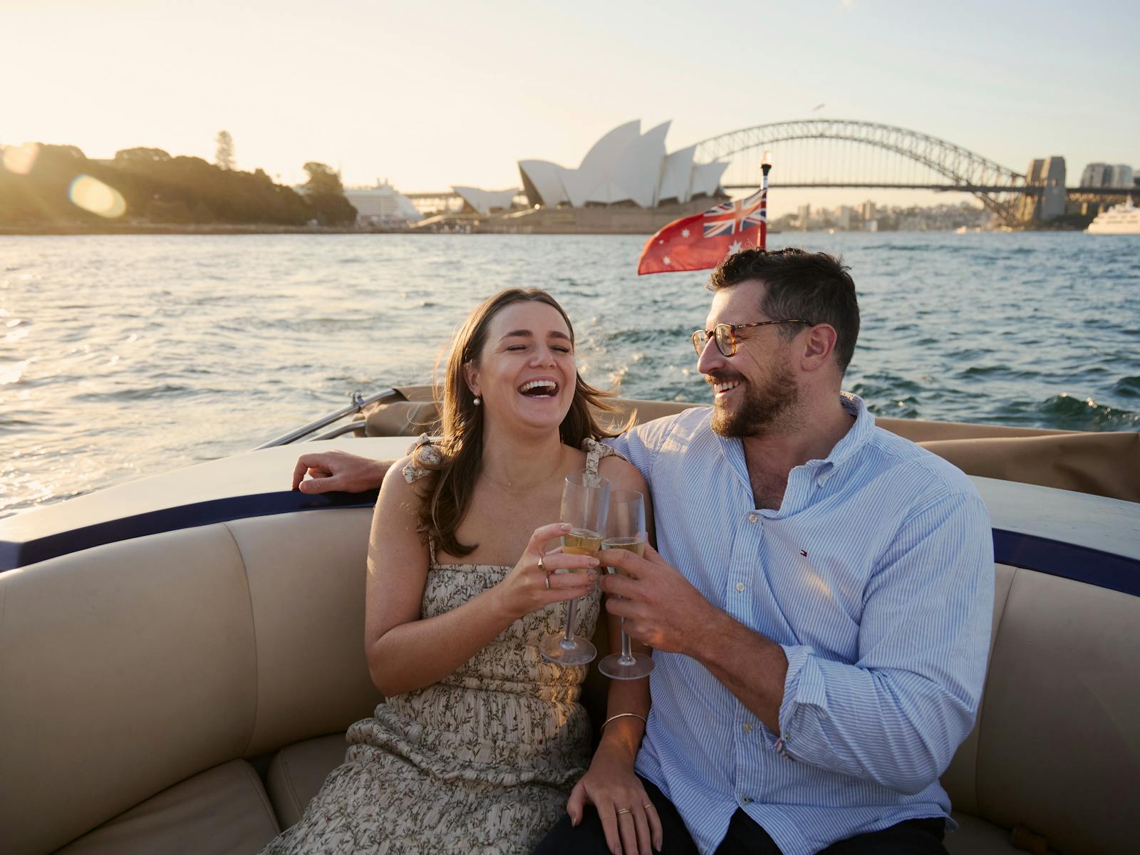 Private boat tour on MV Aquamajestic cruising Sydney Harbour with city skyline views.