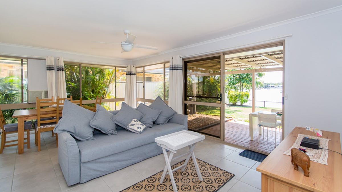 Lounge room with canal views