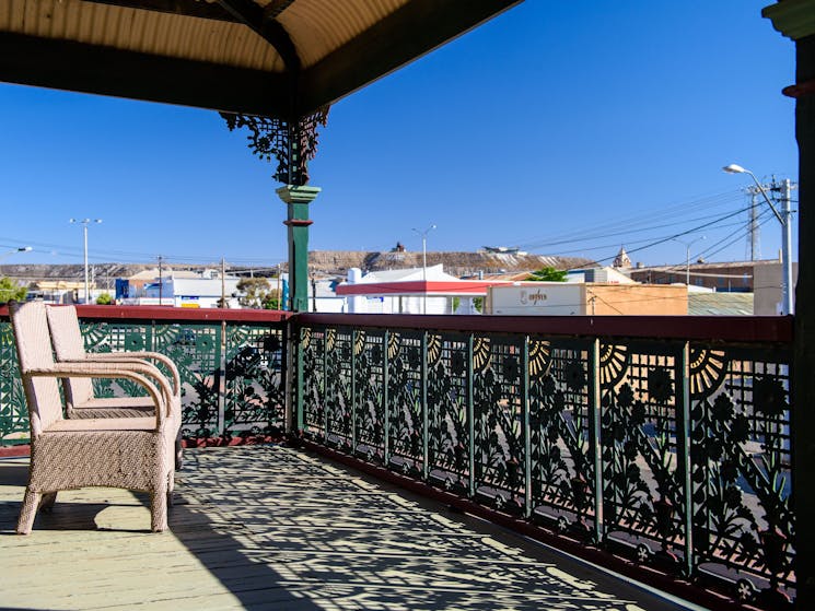 Chairs and table located on the veranda