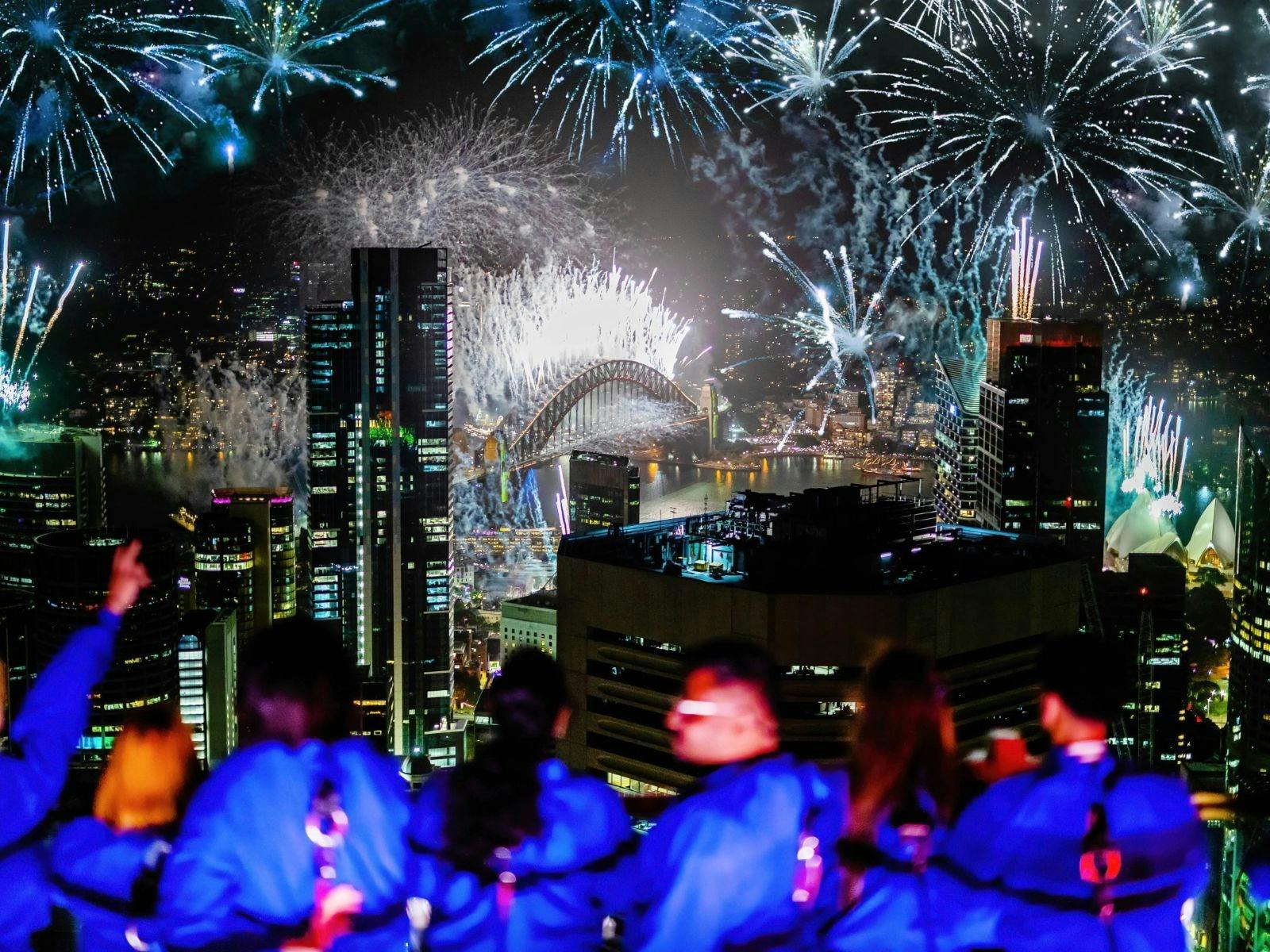New Year's Eve patrons enjoying the midnight fireworks at Sydney Tower Eye on SKYWALK