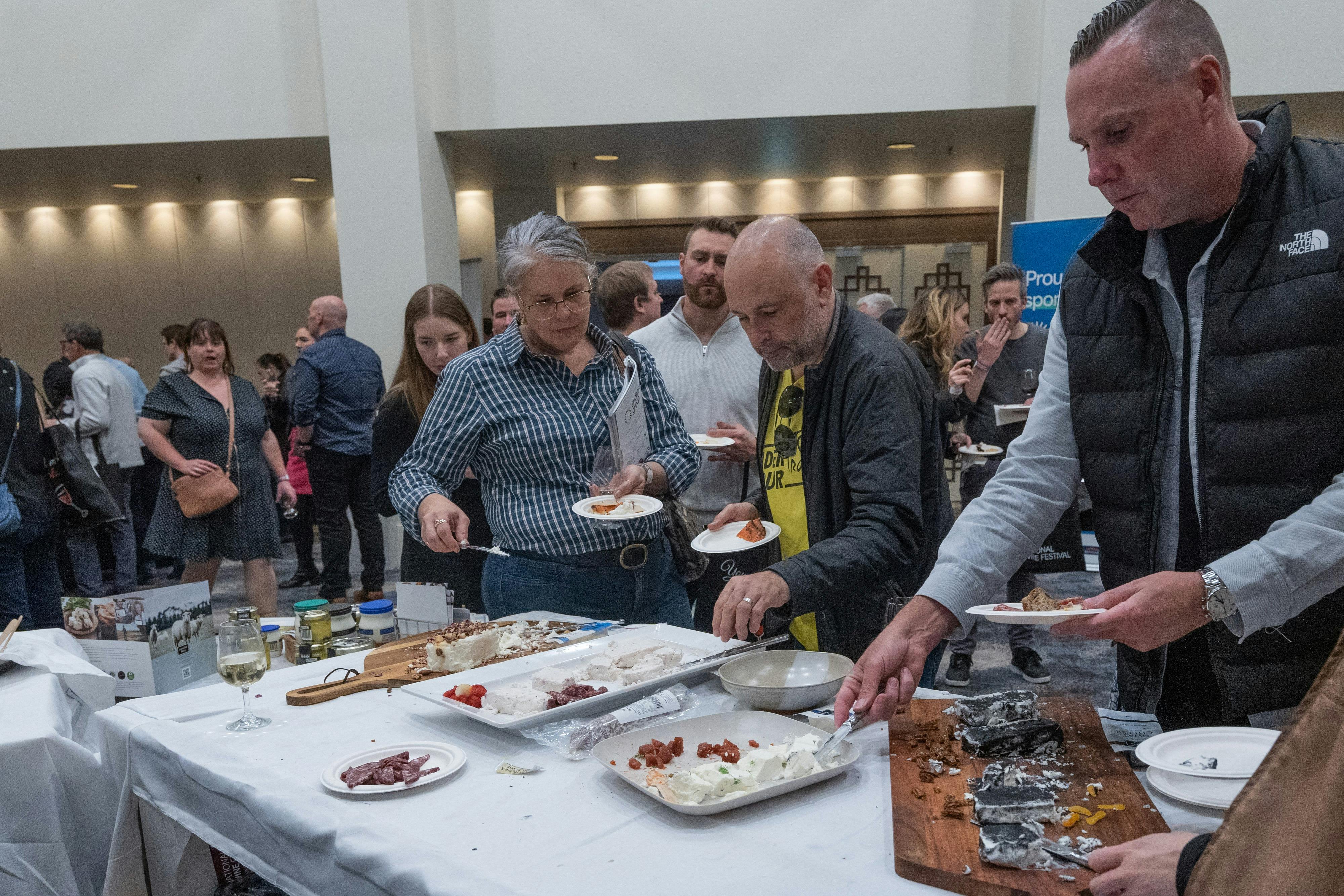 National Wine Festival - People eating Meredith Dairy cheese and crackers