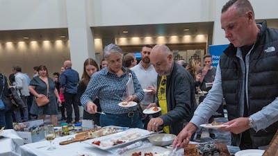 National Wine Festival - People eating Meredith Dairy cheese and crackers