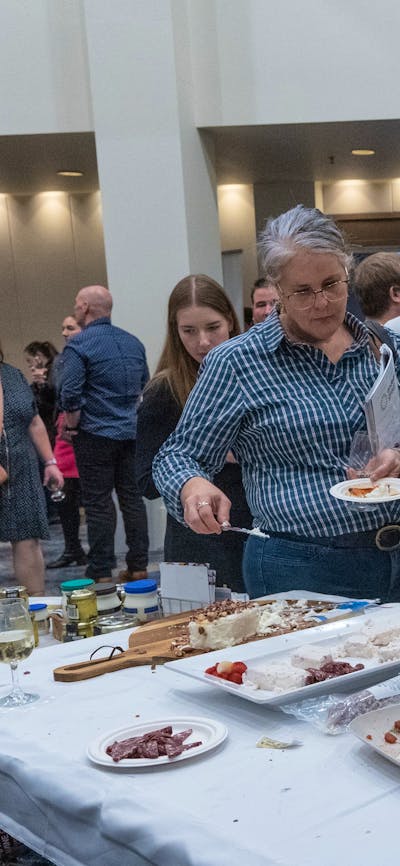 National Wine Festival - People eating Meredith Dairy cheese and crackers