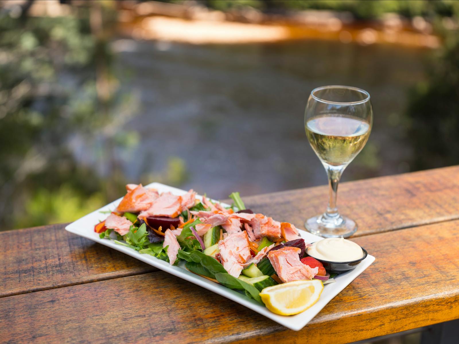 Tahune Adventures cafe open business hours daily, tasty Salmon salad with fine Tasmanian white wine.