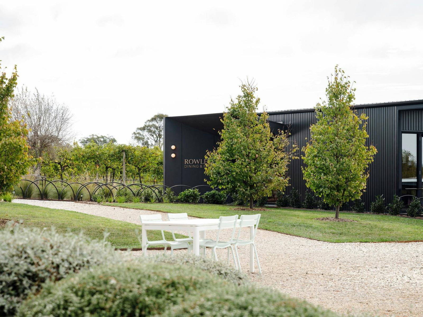 Restaurant at Rowlee wines with vineyard, garden and black exterior