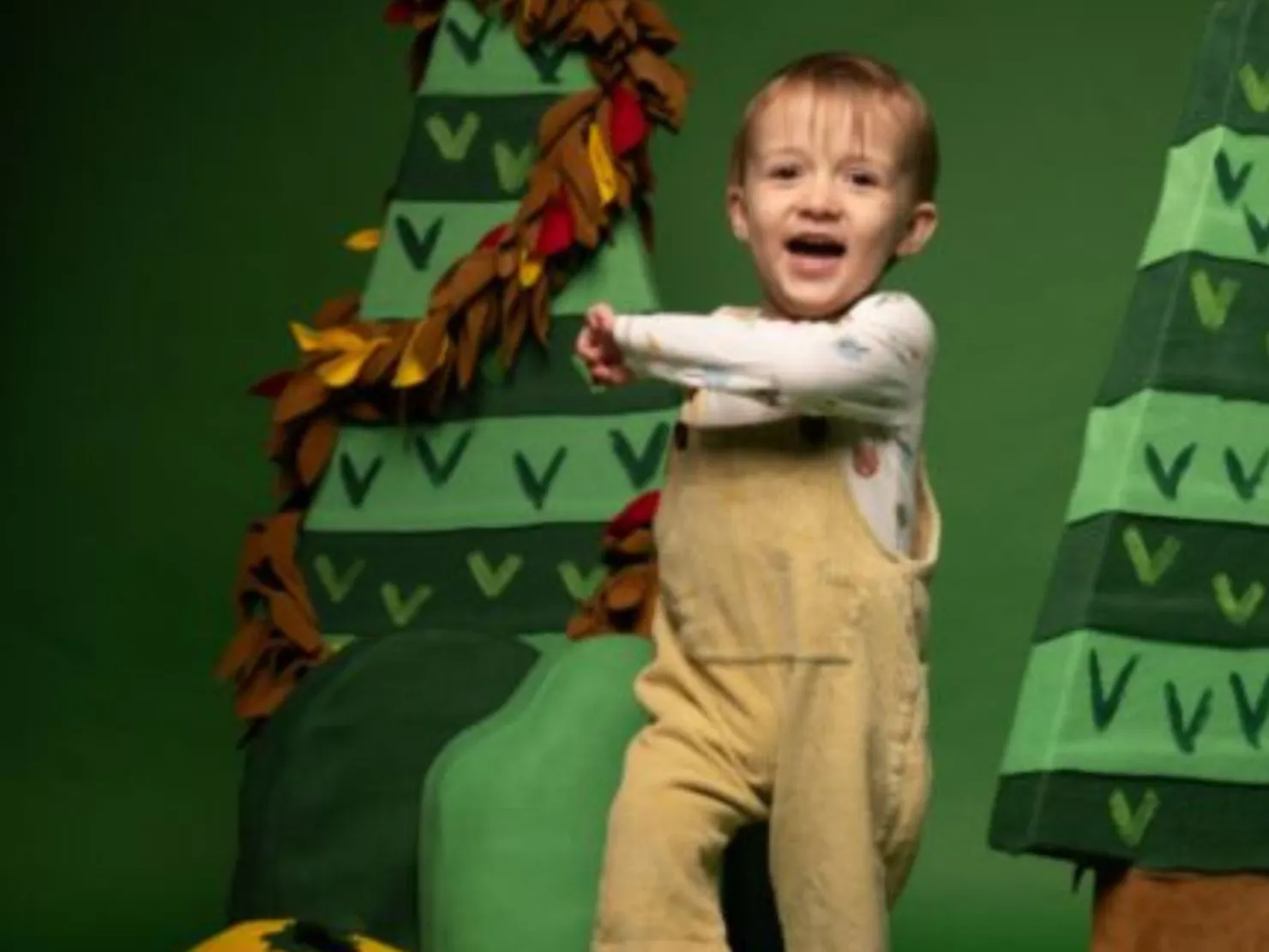 little child with green background