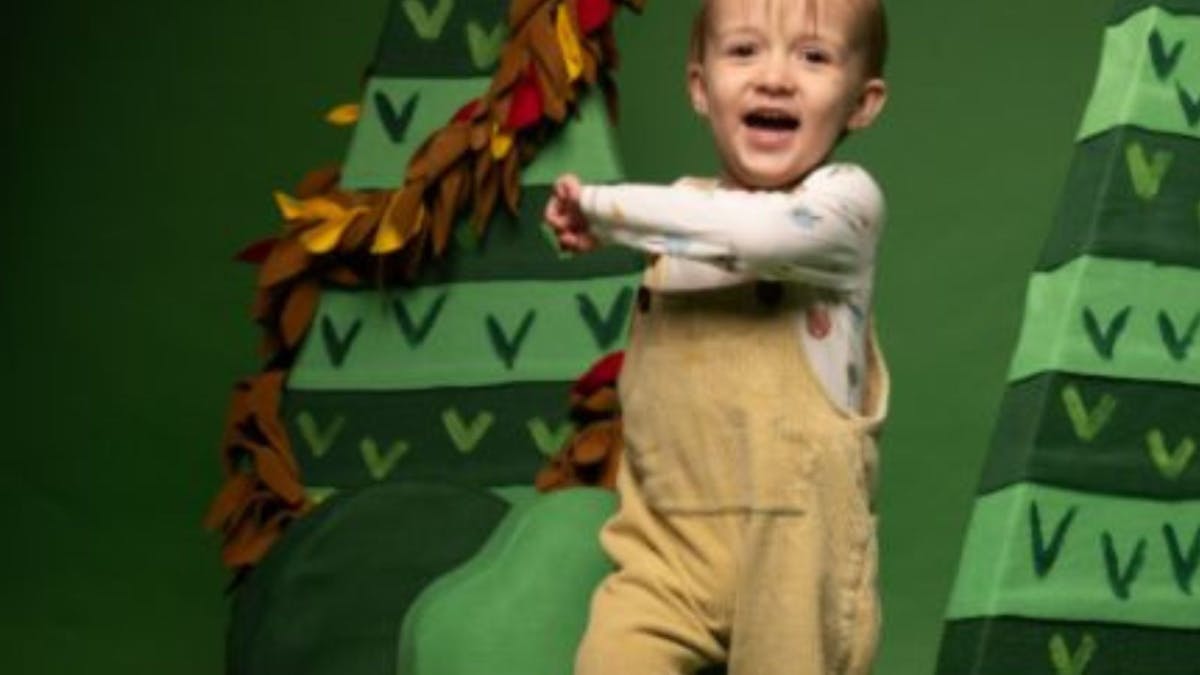 little child with green background little child with green background