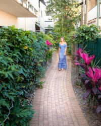 Pathway surrounded by tropical gardens