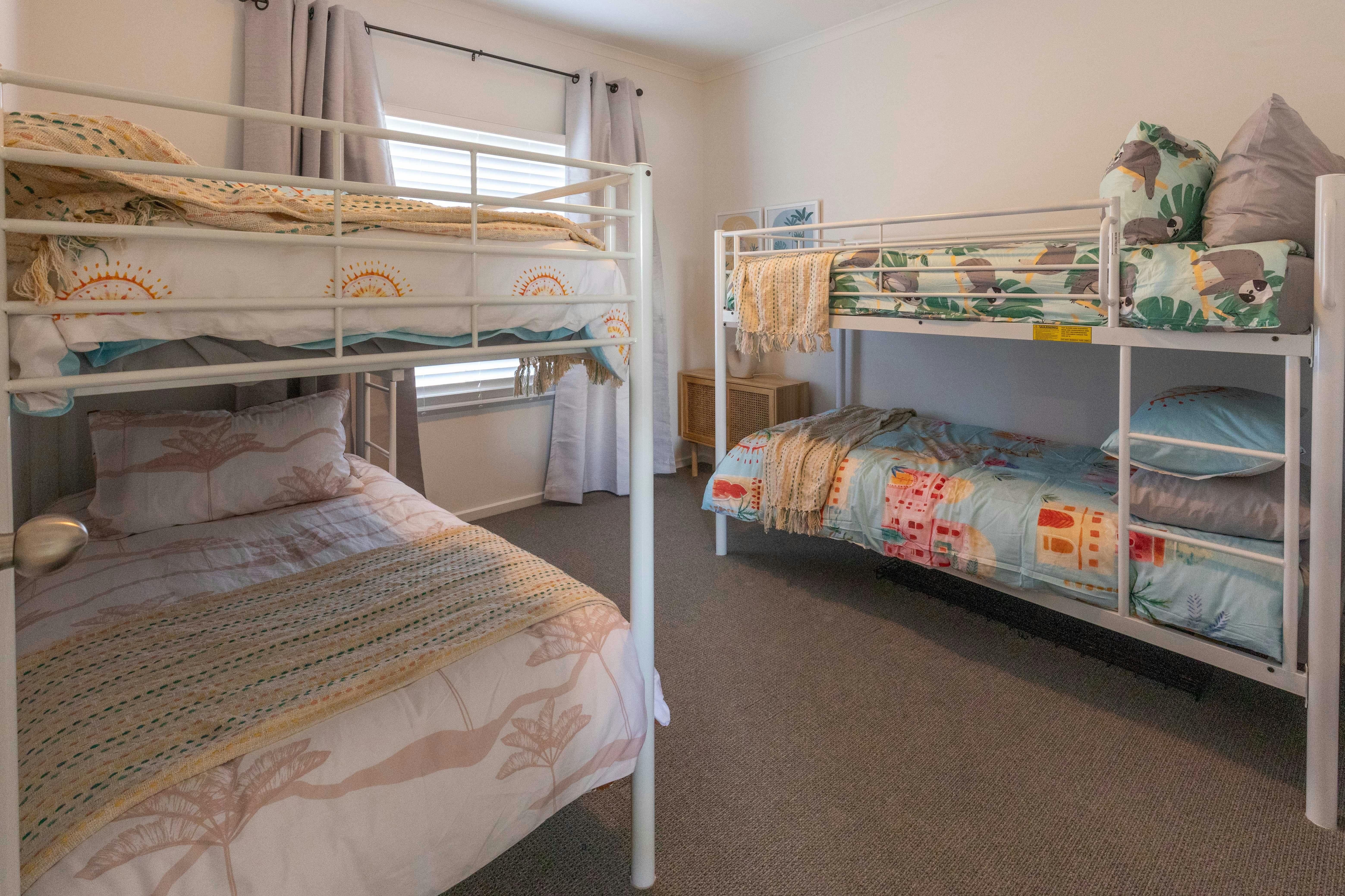 kids bedroom with two bunks