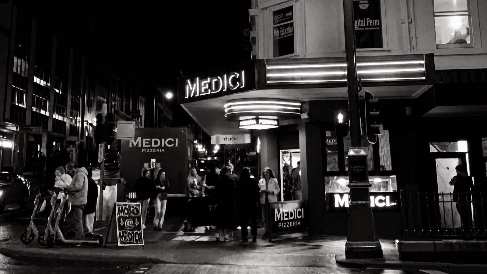 The Medici Pizzeria corner in central Hobart on a winter evening