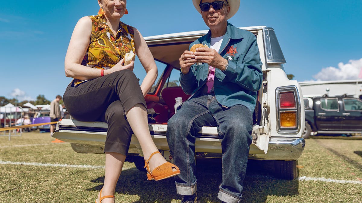 Two people having lunch at GreazeFest