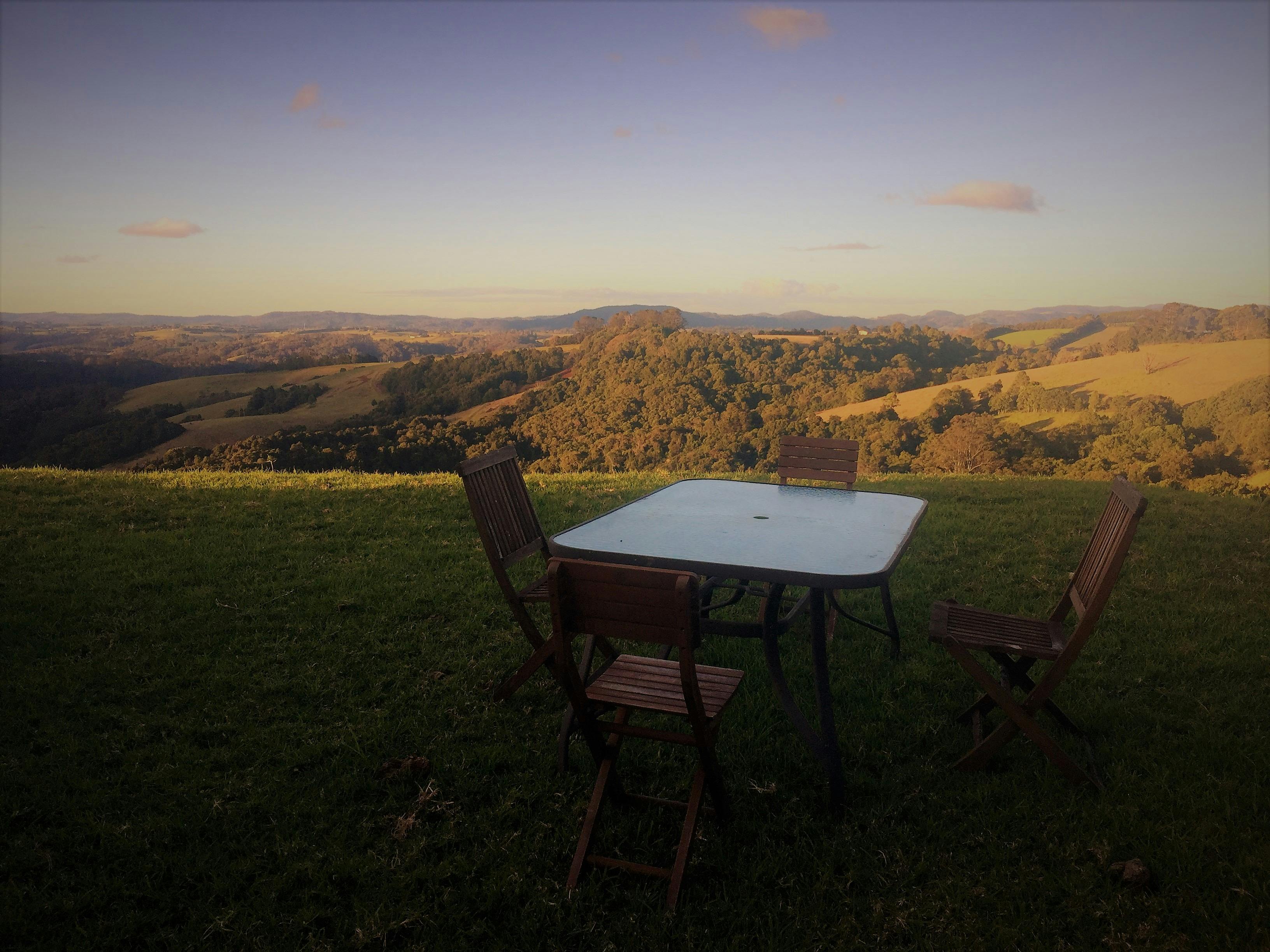 Outdoor setting with views over the valley nestled in a private garden